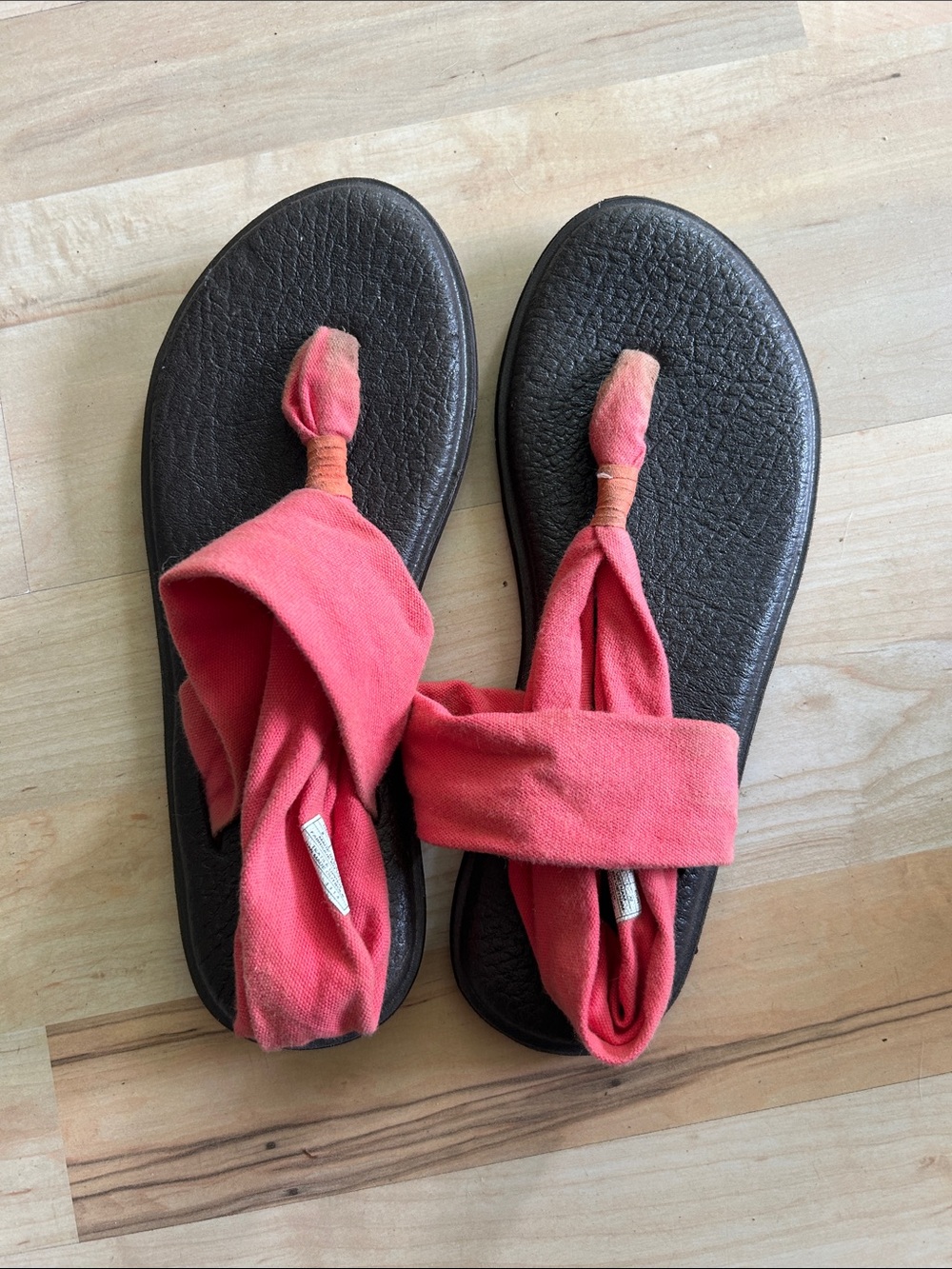 Sanuk Yoga Sling 2 sandals in a coral pink color